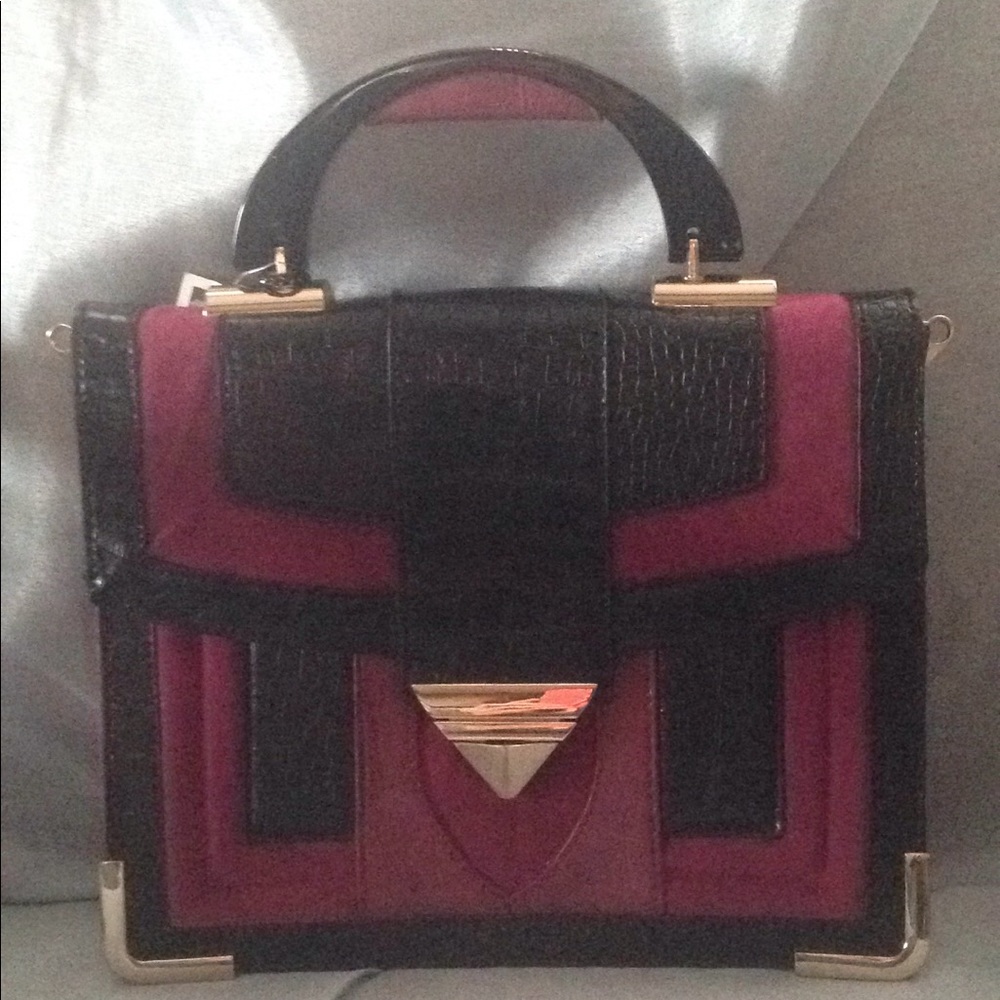 Fucia and black pieceworked handbag